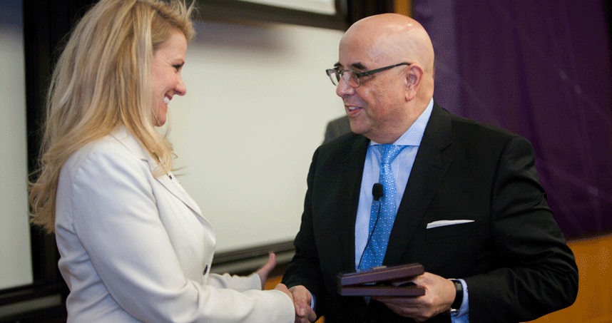 Shotwell presented Dean Julio M. Ottino with the gold medal she chose to donate to Northwestern. Credit: Sally Ryan
