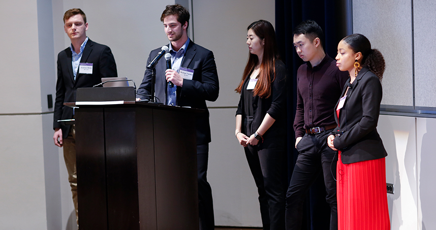 Michael Tamkin, a senior in computer science, demonstrated his team's legal research resource. Credit: Jasmin Shah