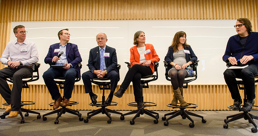 Faculty and robotics experts participated in the "Our Future with Robots" panel moderated by Rob Wolcott.