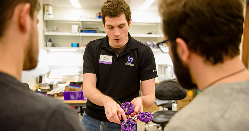 Petras Swissler presented unstructured self-assembling robots during the center's open house.