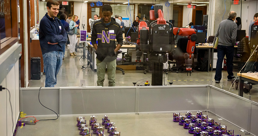 Professor Michael Rubenstein showcased swarming robots that could make the Northwestern logo.