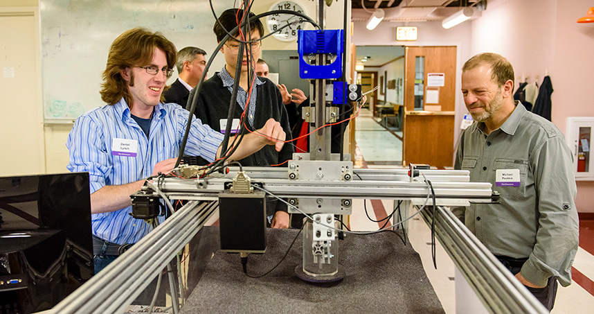 Dan Lynch presented a robot that can run through sand as part of the center's demonstration stations.