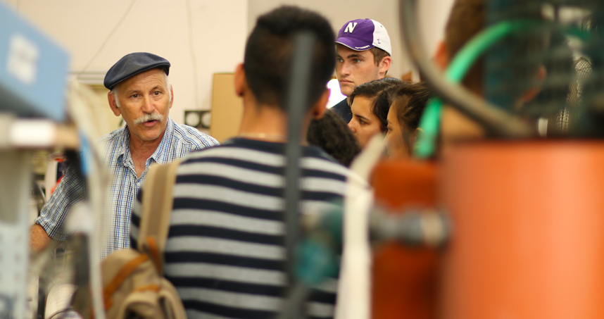 Jack Gilron (in grey hat) gives Northwestern students a tour of a desalination lab in Israel.