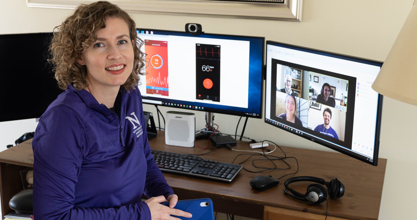 Casey Ankeny sits at her at-home workstation.