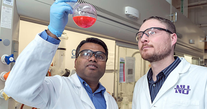 Suvendu Biswas and Mark Karver in SQI's Peptide Synthesis Core Facility.