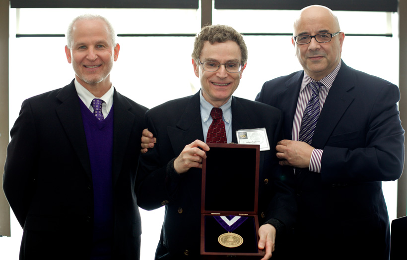 Allen Taflove stands with Northwestern University President Morton Schapiro and Northwestern Engineering Dean Julio M. Ottino at a ceremony celebrating Taflove being named Bette and Neison Harris Professor of Teaching Excellence in 2010.