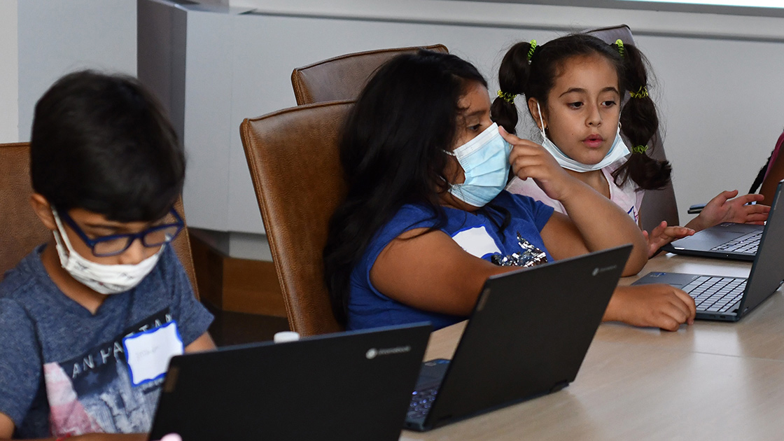 Intro to programming students learning the basics of coding