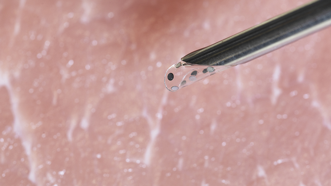 The sticker is so small that it can fit (rolled up) inside of a syringe to be injected non-invasively