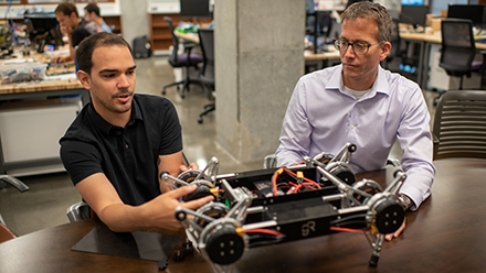 The research of Todd Murphey, right, focuses on robotics, control theory, and computational methods for decision-making in complex systems.