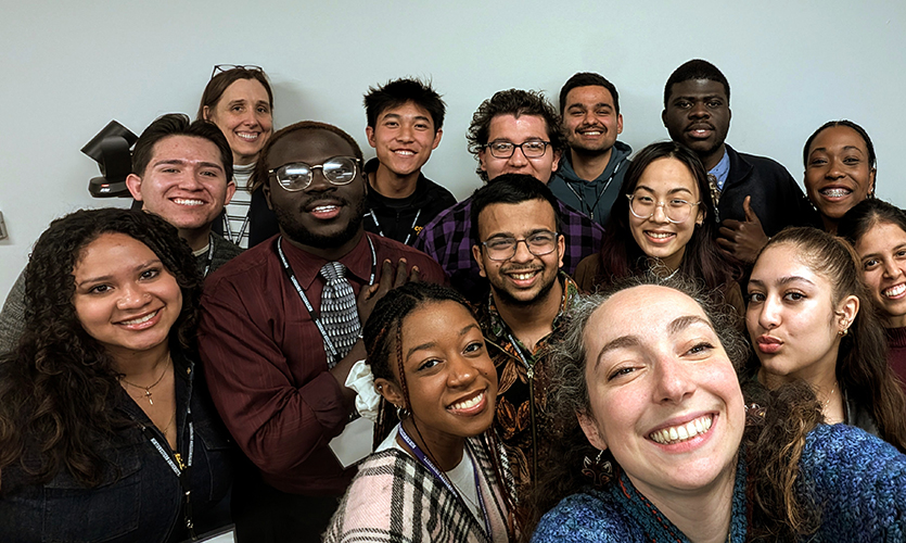 Professor Cécile Chazot, bottom right, snaps a photo with the students during MICRO's annual summit.