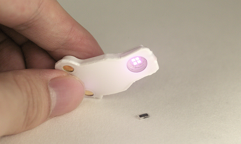 When the wearable device blinks light, it activates the tiny pacemaker.