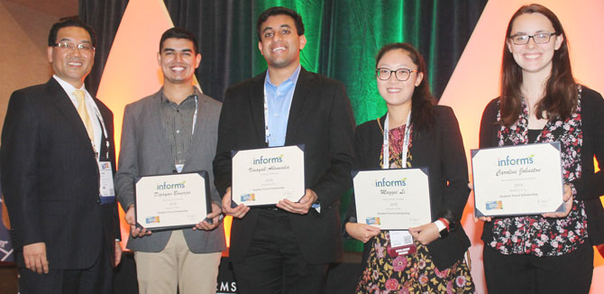Dipayan Banerjee (second from left) receives the INFORMS Inaugural Undergraduate Student Scholarship.