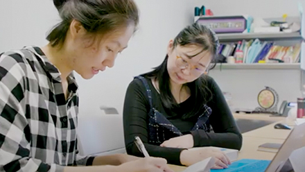 A professor and student collaborating on research