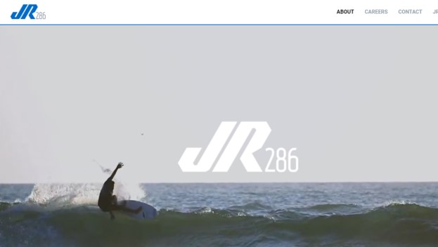 Image of a man surfing in the ocean