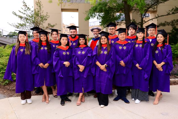 Members of the MSIT Class of 2022 ready to march into the arena.