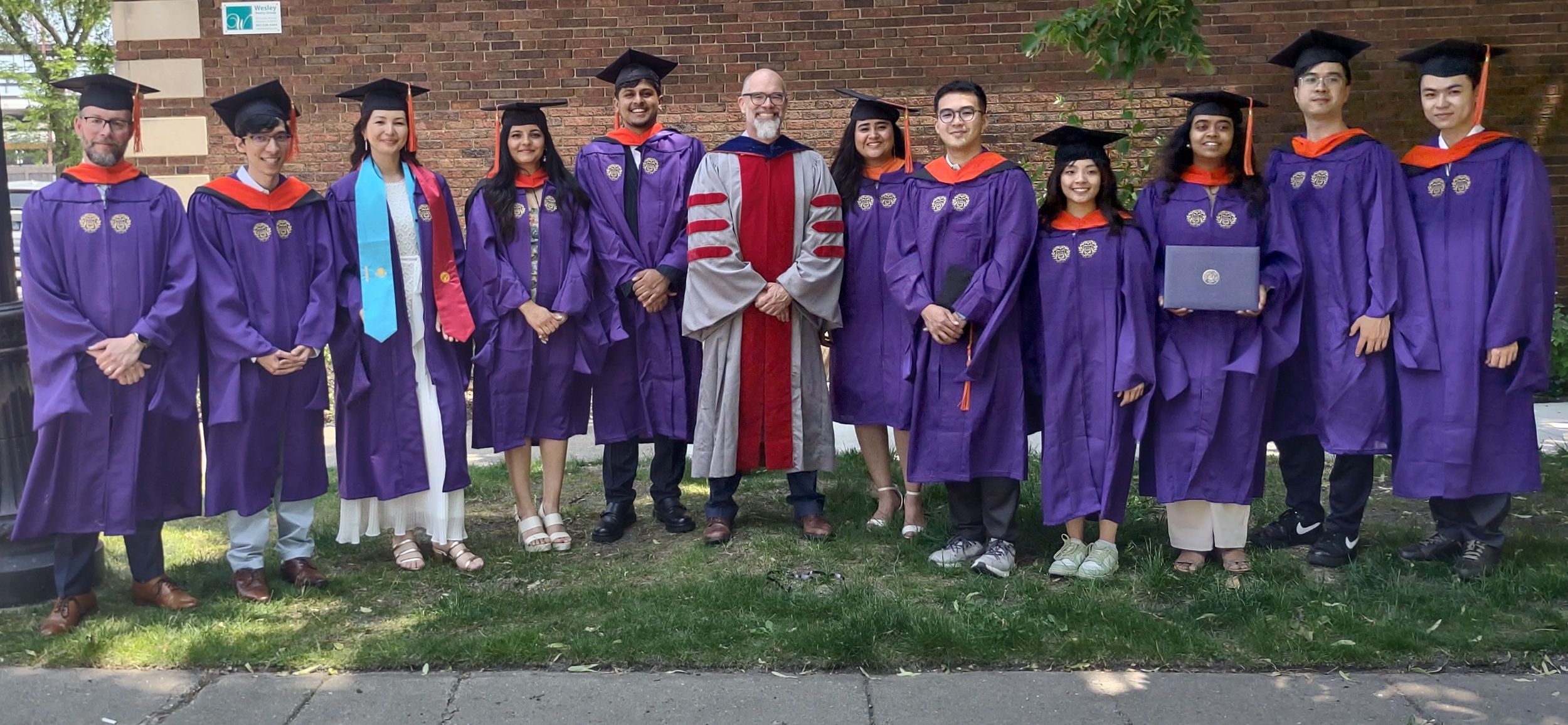 Members of the MSIT Class of 2025 celebrating before they march into the arena.