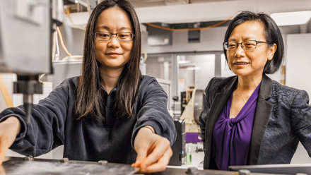 Jian Cao and a student in the lab