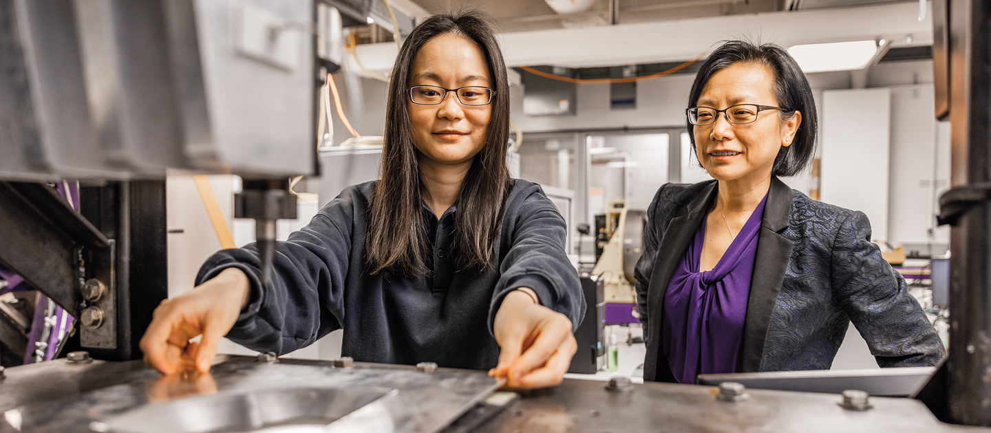 Jian Cao and a student in the lab