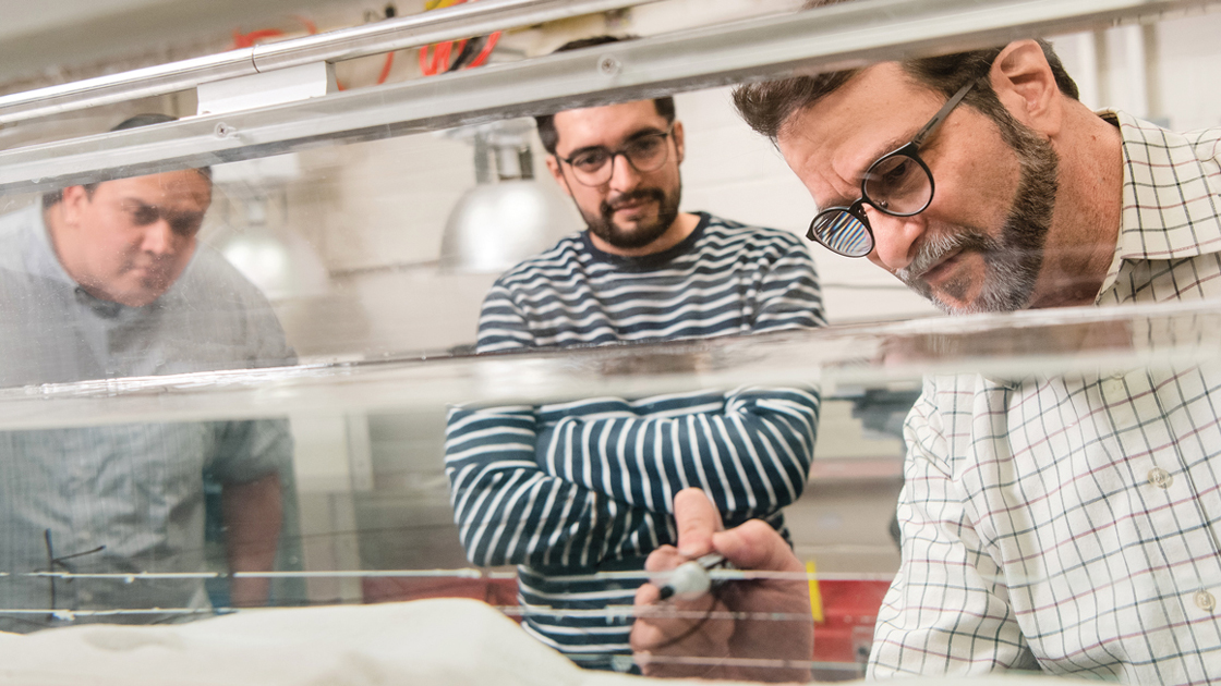 Aaron Packman and fellow researchers in the lab