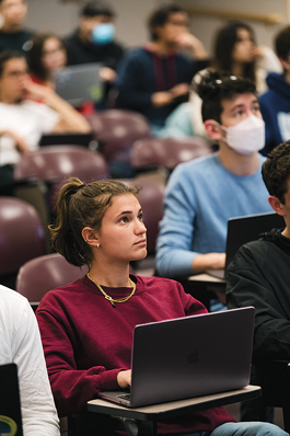 Computer science students listening in a lecture hall
