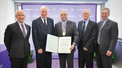 Julio M. Ottino accepts the Bernard M. Gordon Prize in 2017. From left: Northwestern president Morton Schapiro, NAE president Dan Mote, Ottino, BMG Charitable Trust officer Ross Brown, Northwestern provost Dan Linzer.