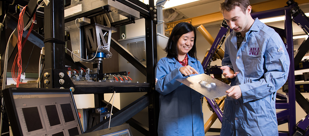 Professor and student working in a lab