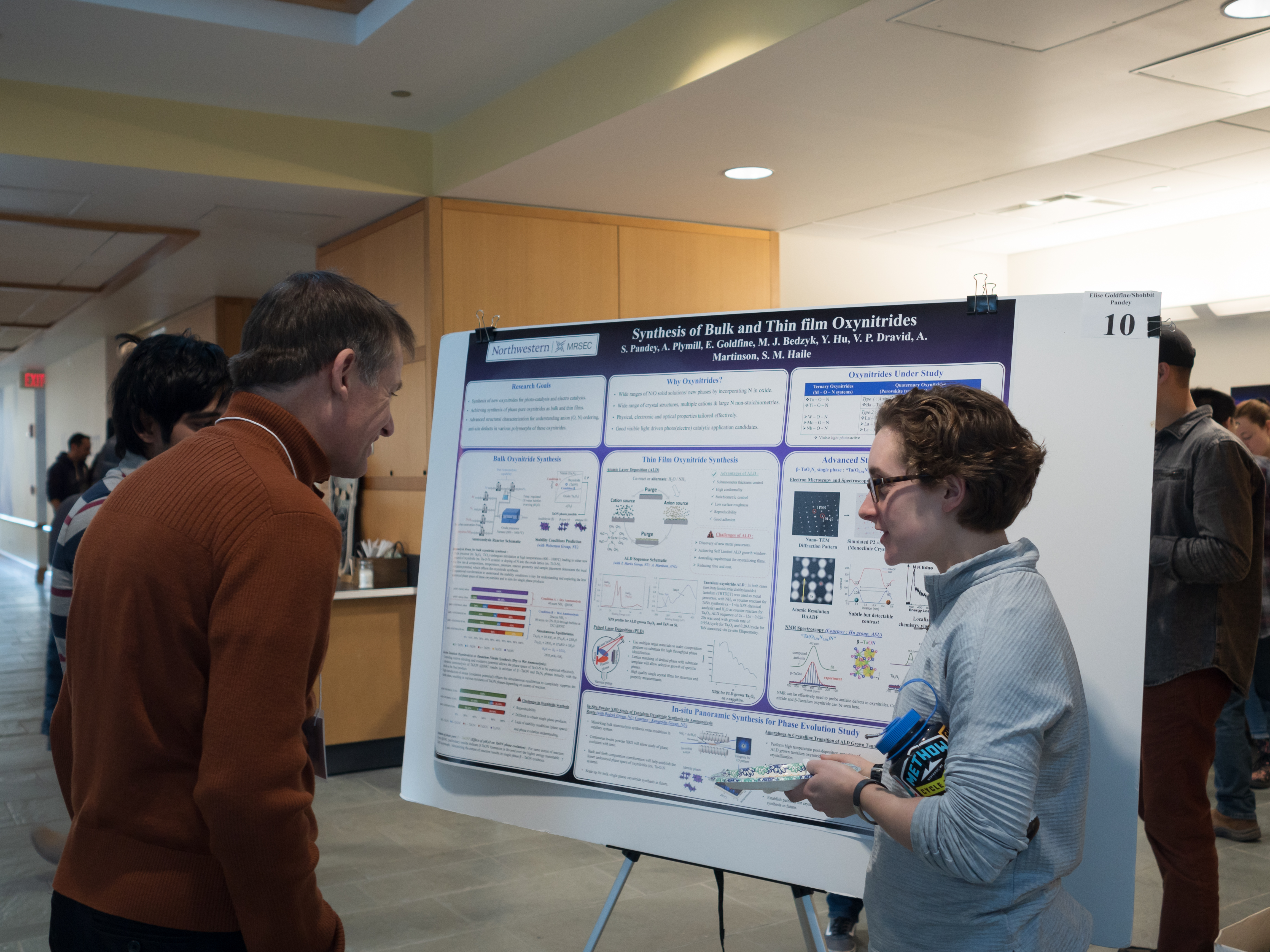 Judging in action! Poster presenters Shobhit Pandey and Elise Goldfine judged by Prof. Erik Luijten.