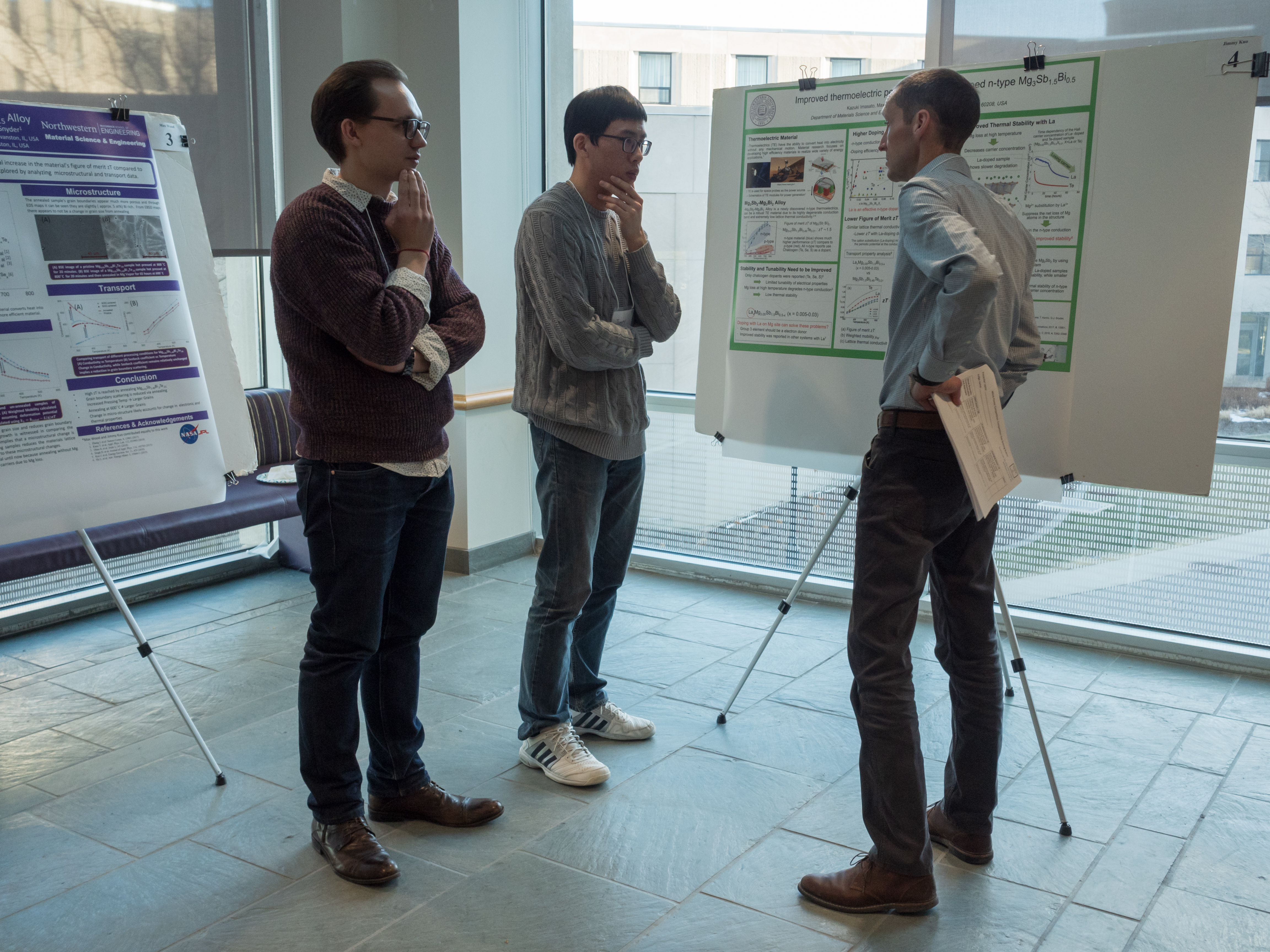 Judging in action! Poster presenters Max Wood and Jimmy Kuo judged by Prof. Lincoln Lauhon.