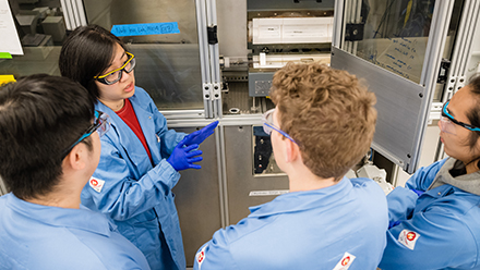 Students collaborate in lab