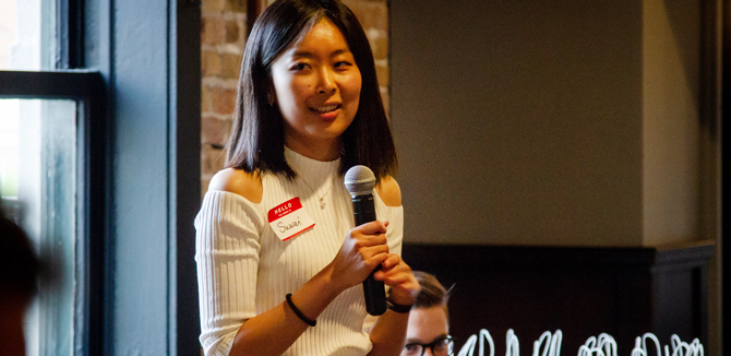 Suwei Liu addresses faculty and staff.