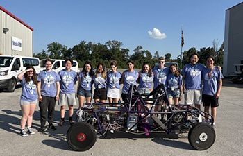 NUsolar team with their car