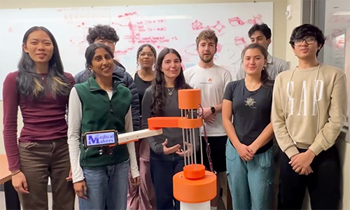 Medical Makers students posing around their device