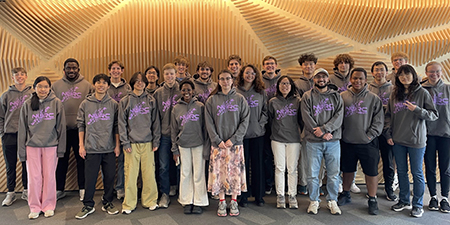 Students posed in matching team sweatshirts