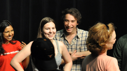 Group of students talking and laughing