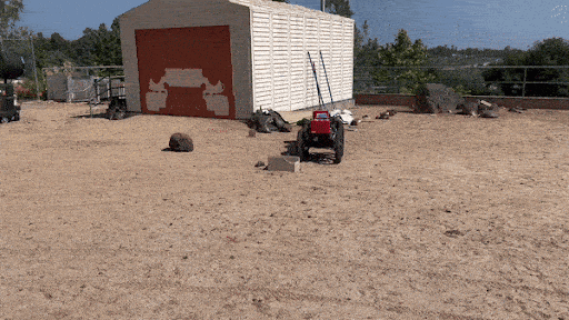 A robot travels across uneven terrain